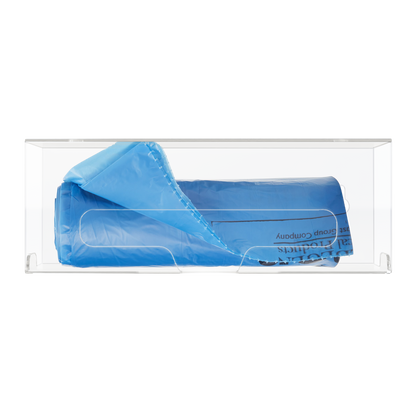 Clear PETG single compartment bag dispenser with side hole for loading and front bottom hole for dispensing. Showing Linen bags.